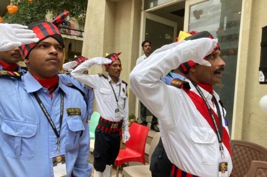Guards saluting at a flag hoisting